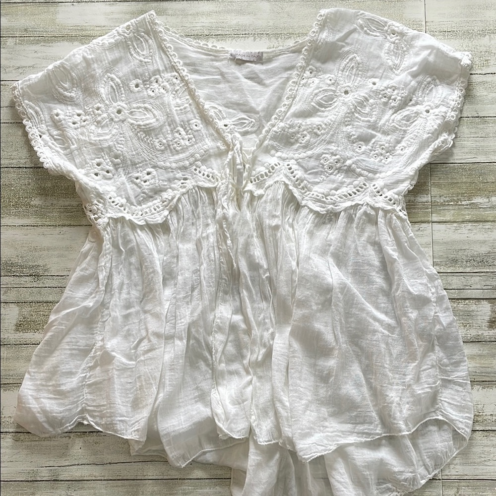 White Flutter Sleeve Blouse with Ruffled Tie Front